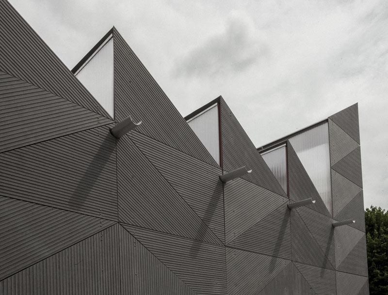 Die Shed-Dächer erinnern an die industrielle Vergangenheit des Quartiers.  Foto: Etex Group
